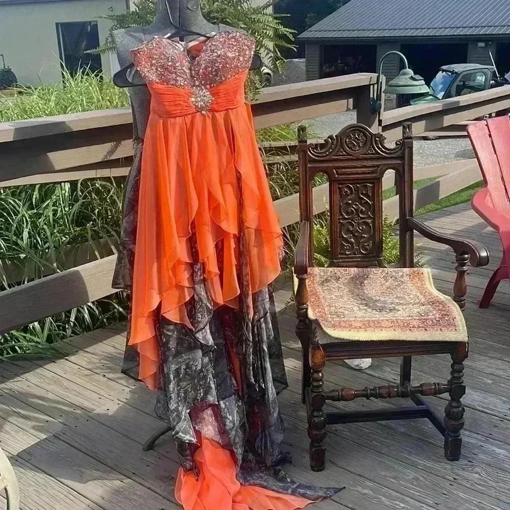 Tiffany design size 4 camouflage and orange formal dress . So unique!